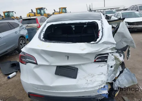 2025 Tesla Model Y Long Range Dual Motor All-Wheel Drive из США, поврежденный, VIN 7SAYGDED9SA357876